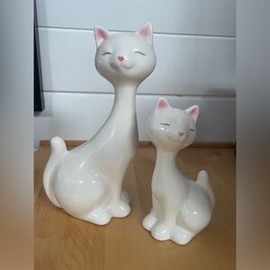 2 White, Ceramic, Retro looking, Siamese cat figurines.